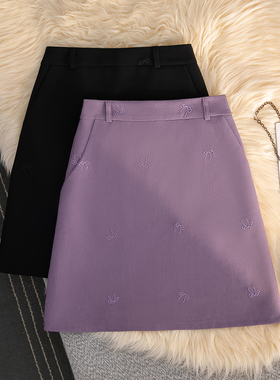 高级感紫色刺绣a字半身裙女秋季2025新款设计感西装气质显瘦短裙