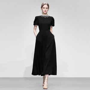 2026夏季时尚复古赫本风长裙订珠钻条领收腰大摆黑色连衣裙女