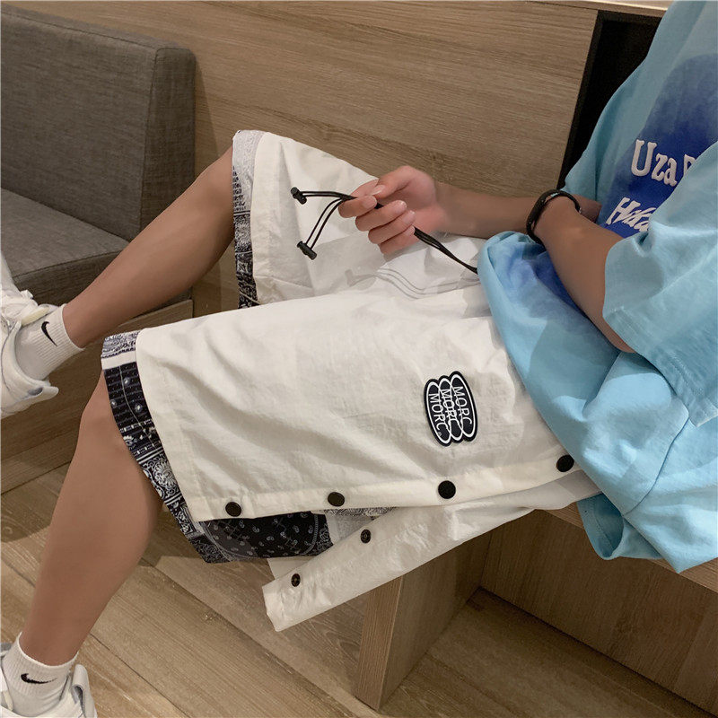 港风夏款男短裤工装贴标腰果印花排扣假两件五分短裤D611 P38图片