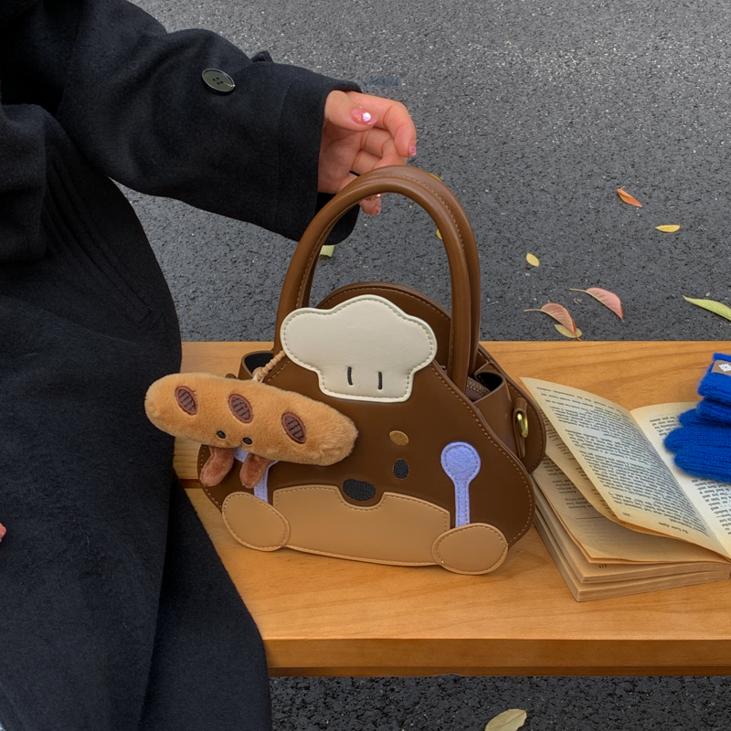 可爱厨师小狗斜挎包女孩子高级感小众设计手提包女童时尚洋气单肩