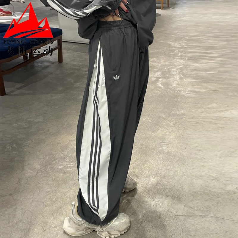 阿迪达斯三叶草女裤2025春新款侧边拉链梭织宽松运动阔腿裤JY8880