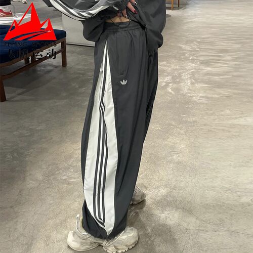 阿迪达斯三叶草女裤2025春新款侧边拉链梭织宽松运动阔腿裤JY8880