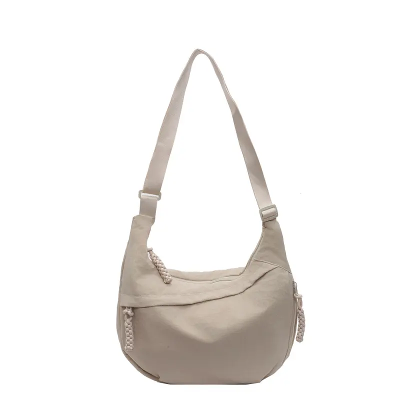 夏季帆布包包女2024新款学生通勤单肩饺子包ins百搭大容量斜挎包