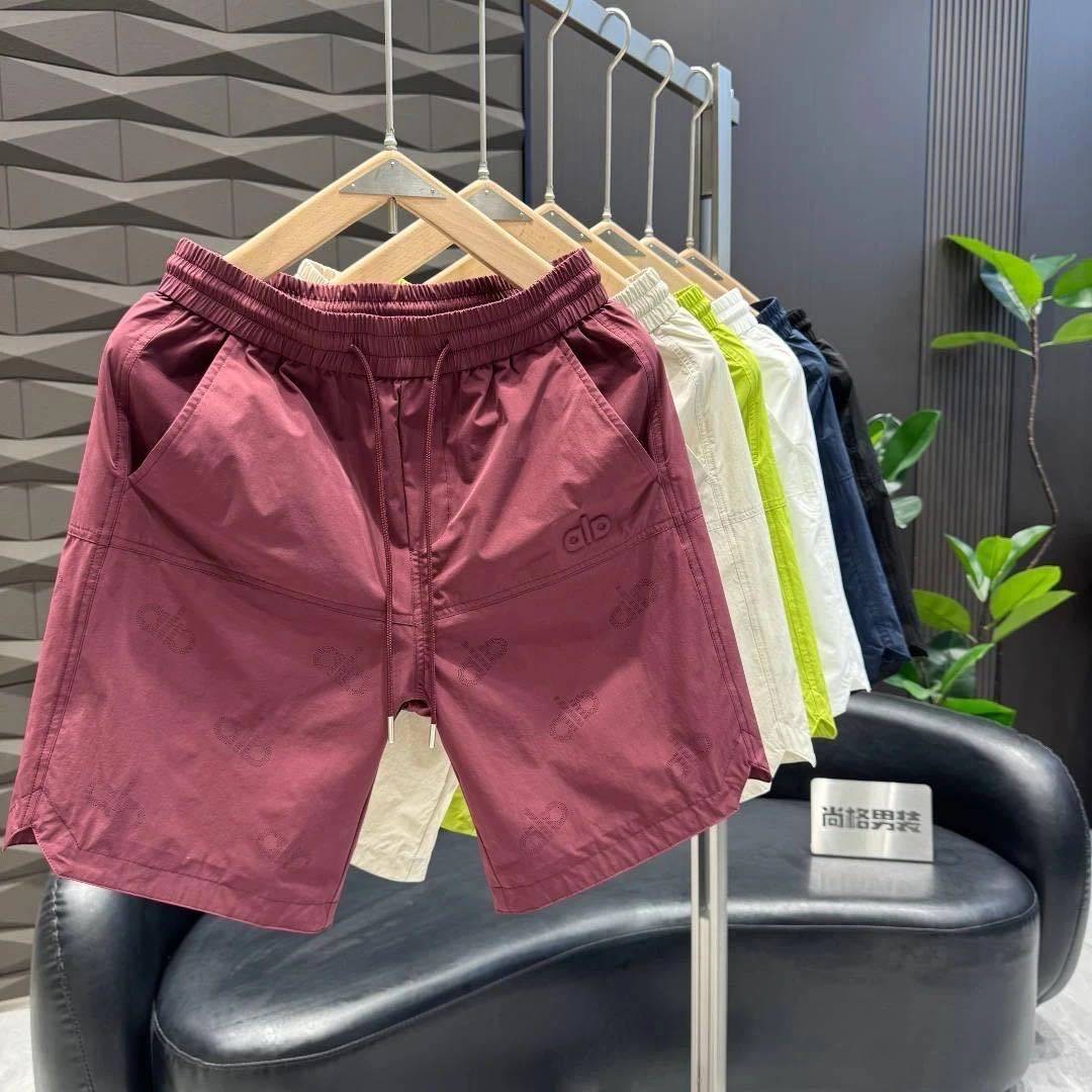 夏季薄款外穿短裤男士潮流宽松激光打孔沙滩裤速干透气刺绣,男装,短裤,淘宝优惠券,粉丝福利购,淘宝优惠卷