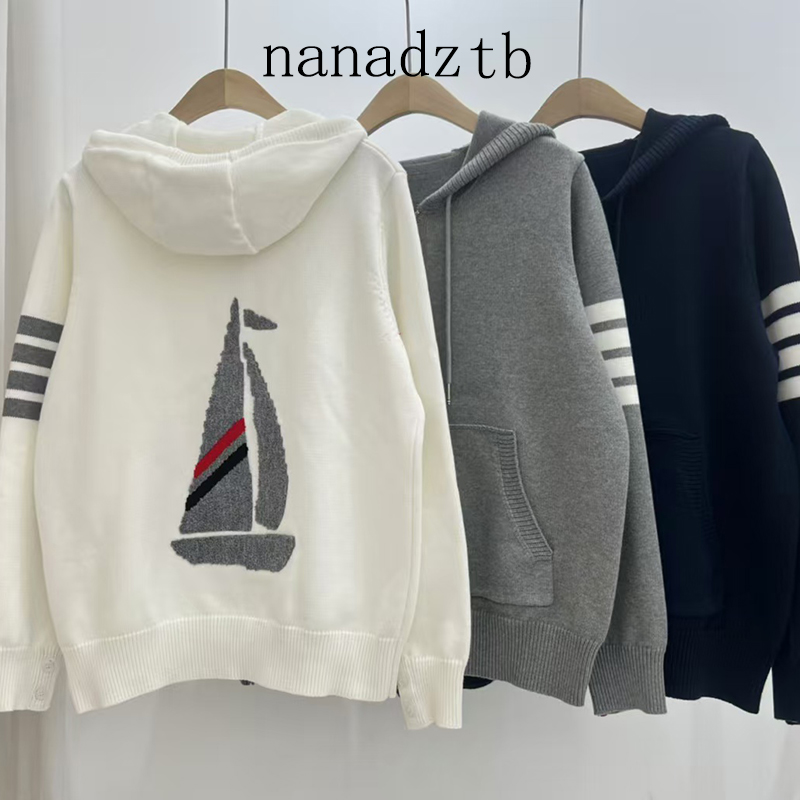 拉链连帽背后帆船提花针织