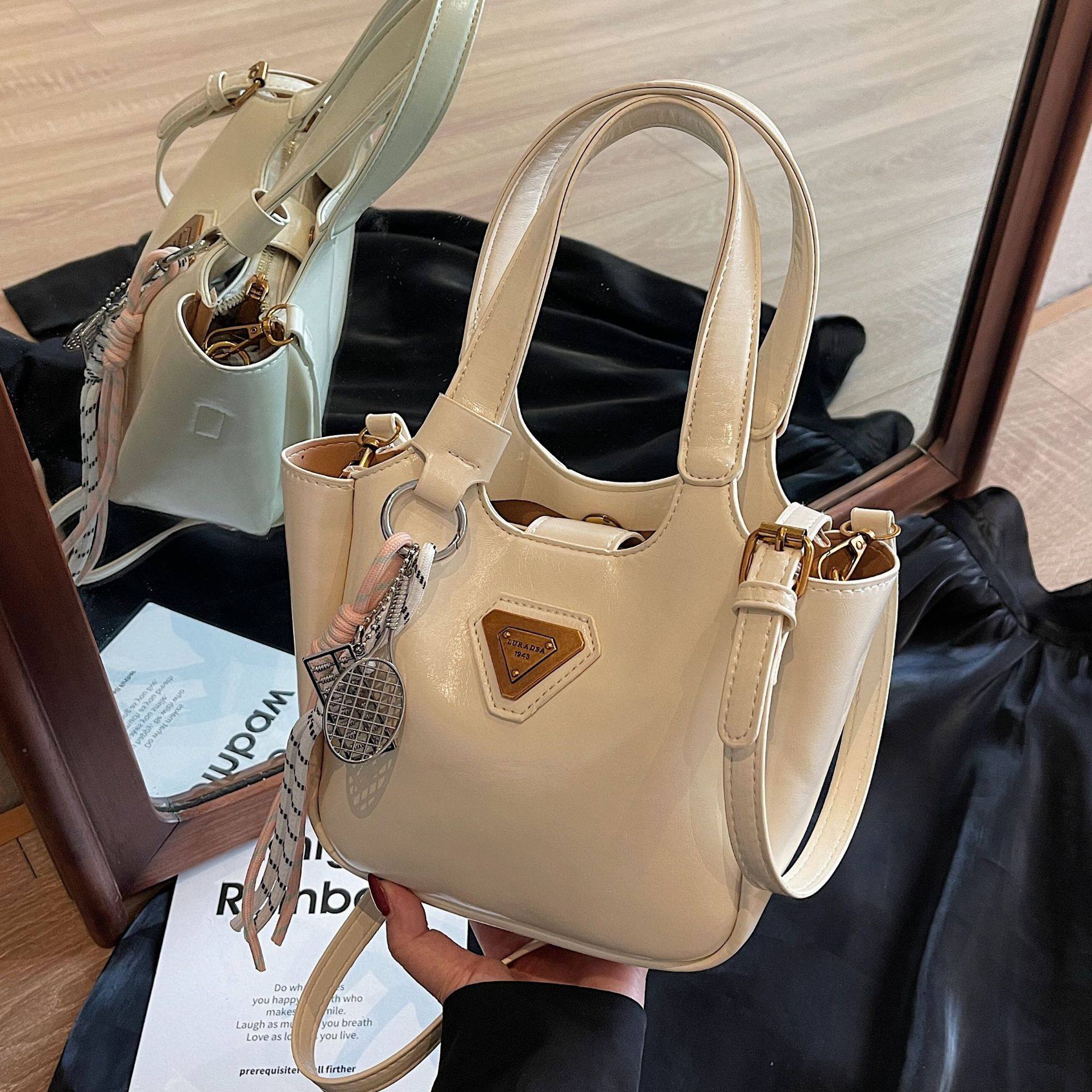 高级感小众包包女2026新款春季百搭休闲斜挎包韩版简约手提水桶包,箱包皮具/热销女包/男包,单肩包,淘宝优惠券,粉丝福利购,淘宝优惠卷