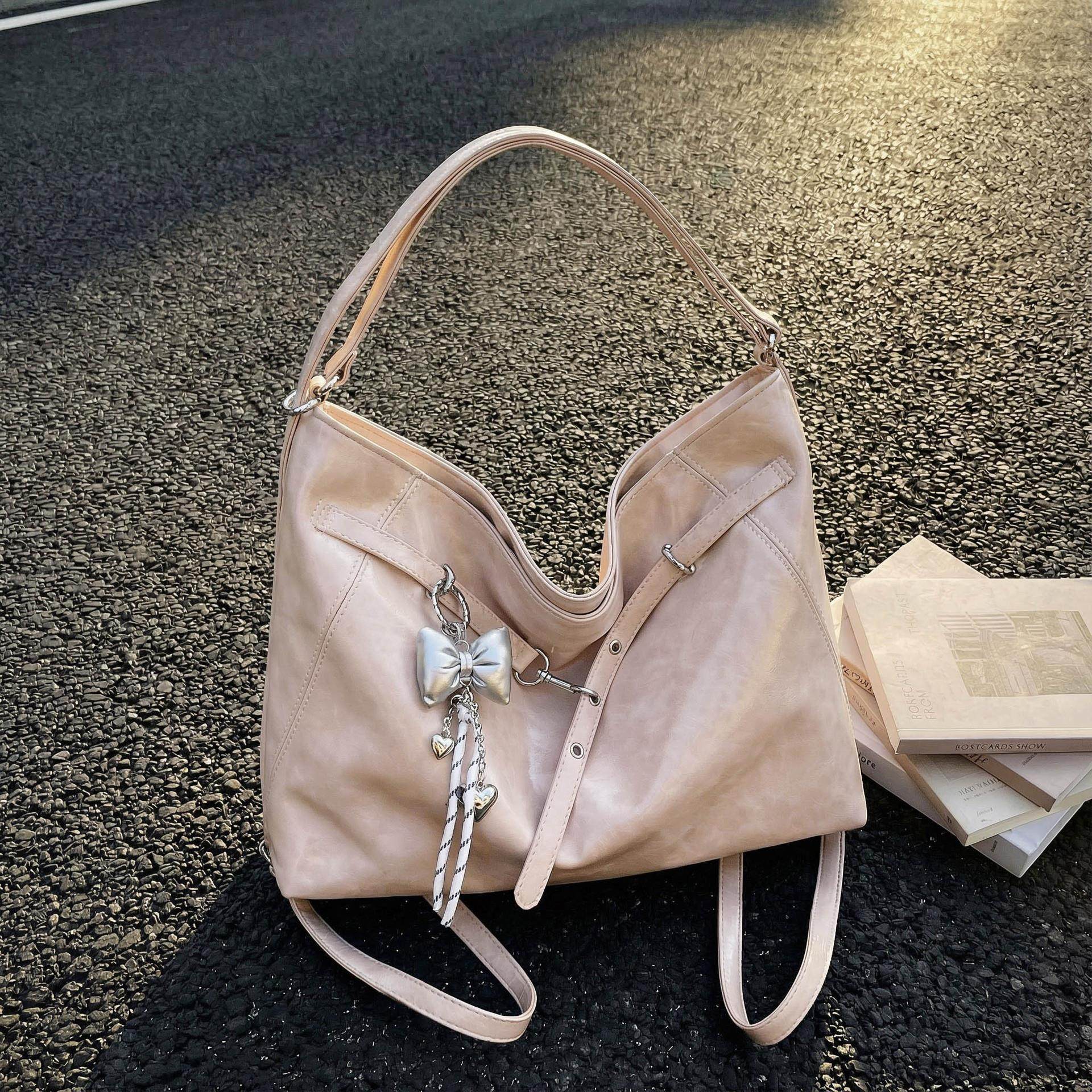 高级感双肩包女2026新款多功能单肩包大容量通勤托特包斜挎水桶包,箱包皮具/热销女包/男包,单肩包,淘宝优惠券,粉丝福利购,淘宝优惠卷