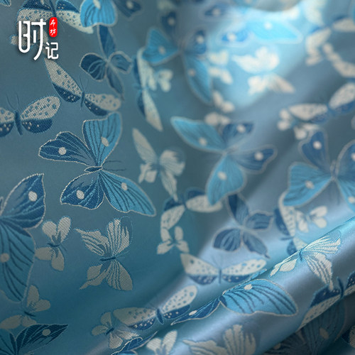 浅蓝色蝴蝶提花布料织锦缎布料