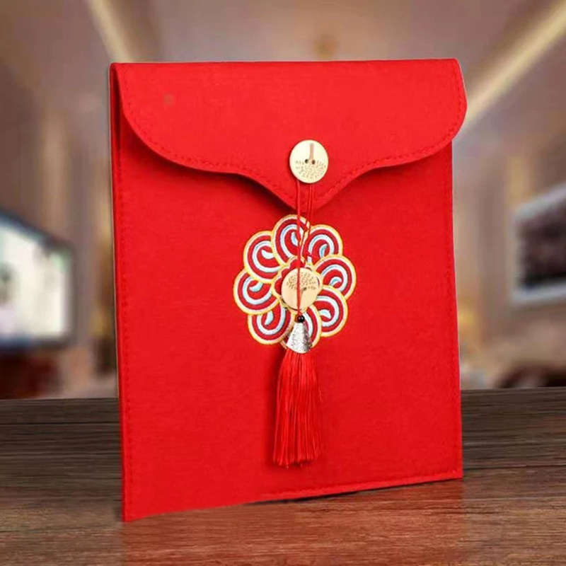 厂家供应2022新品复古刺绣茶叶包 毛毡茶叶包流苏茶叶包现货