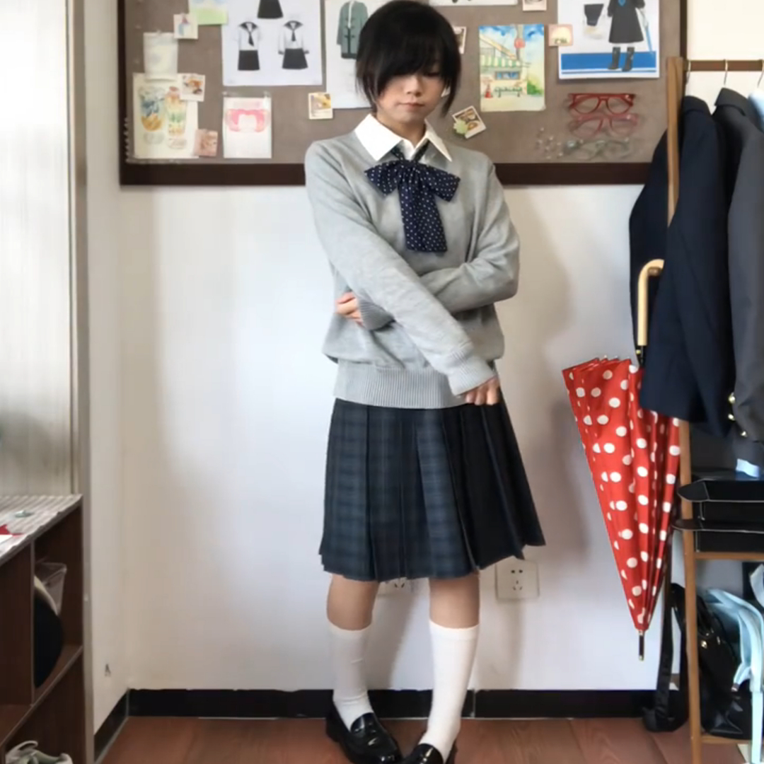 毛衣女中长格裙叠穿校供感西装