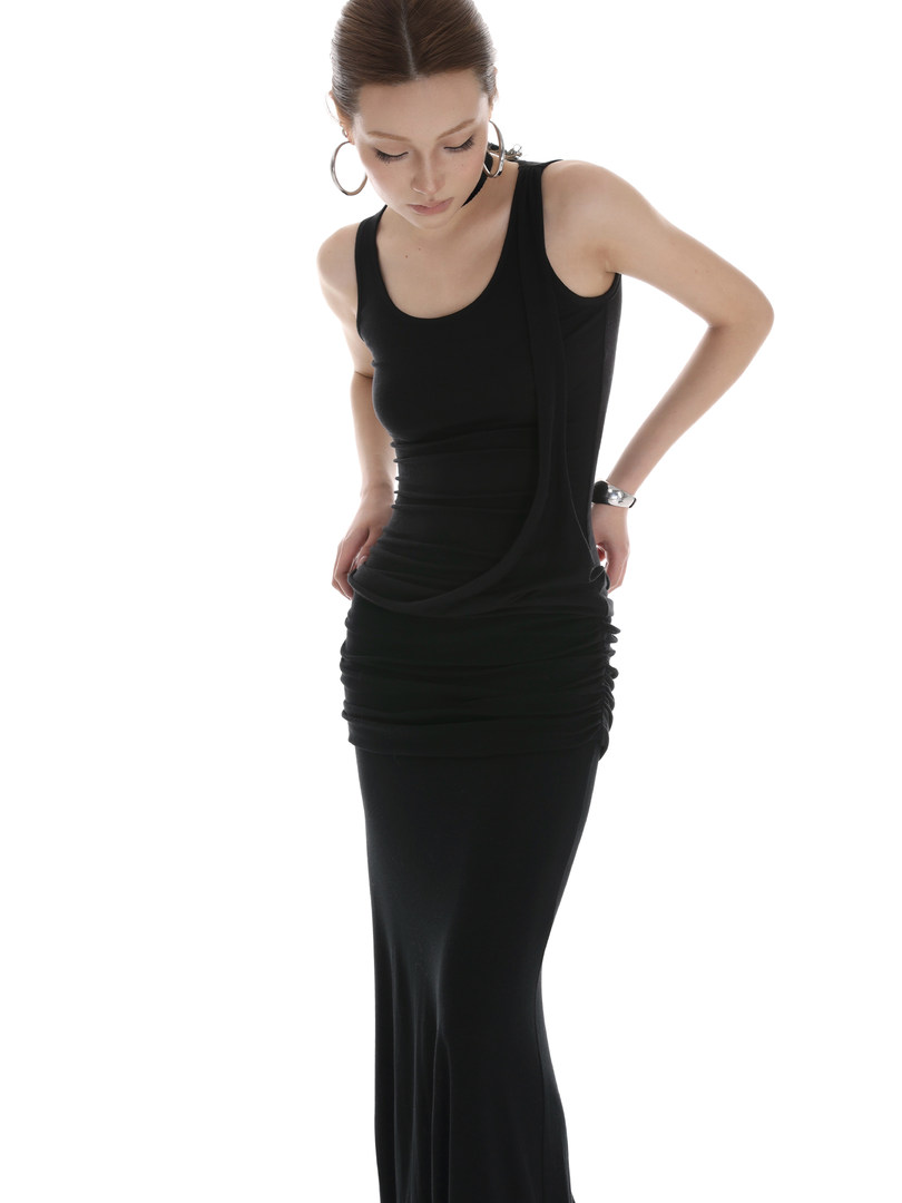 Black fitted sleeveless maxi dress worn by a model