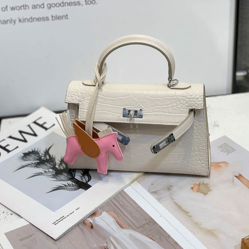 石头纹春夏新版凯莉迷你小包牛皮手提气质单肩斜挎女包抽带锁扣潮