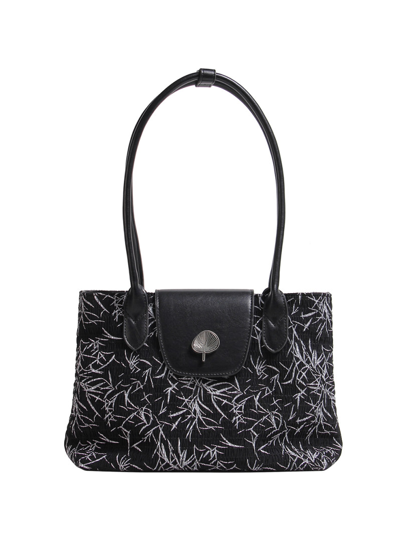 Black patterned handbag with long handles on a white background