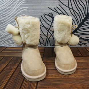 69-3真皮羊皮毛一体雪地靴中筒两穿冬季新款保暖女靴毛球棉靴