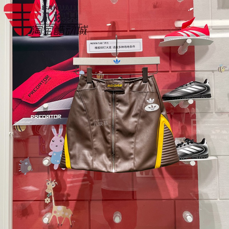 阿迪达斯三叶草女装2025春机车风拼接仿皮A字裙休闲半身裙 JM8026
