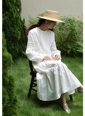 无拘2025年秋季新款A字裙纯白色女连衣裙设计感镂空花边显瘦长裙