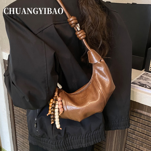 超火可颂牛角包包女式2025新款秋冬高级感小众休闲单肩斜挎饺子包