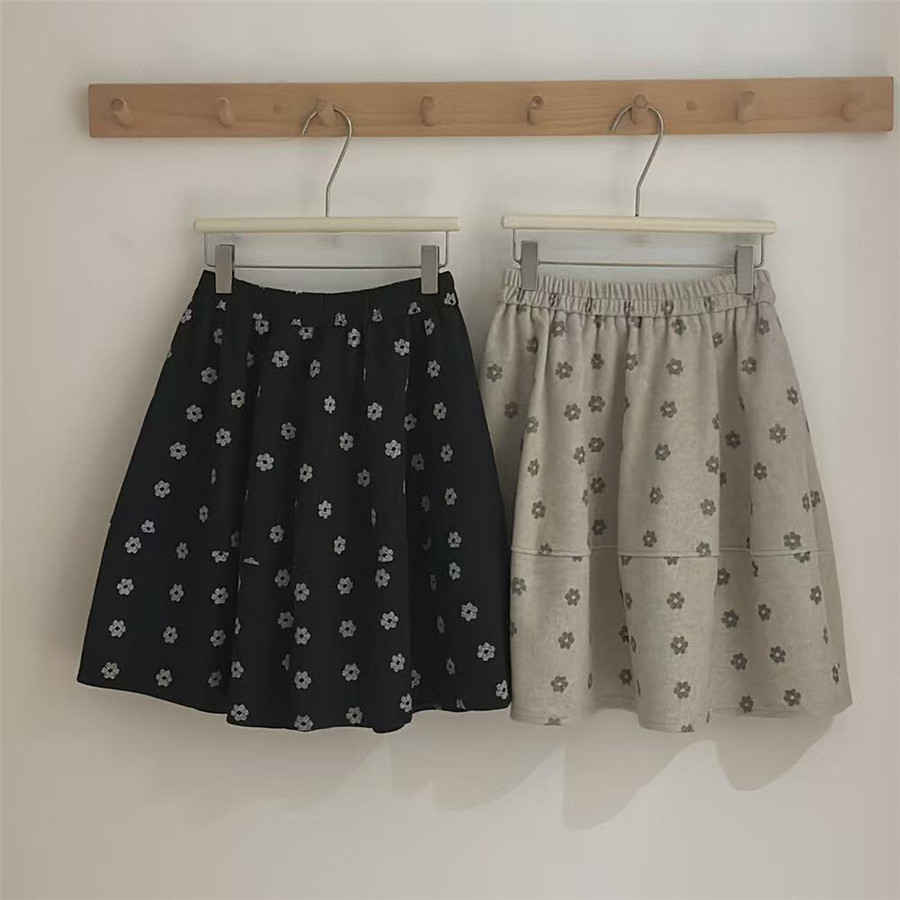 2025冬季黑色杏色花色拼接口袋五分裙时尚质感松紧腰半身裙高腰潮