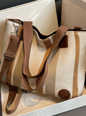 外出通勤包女大容量包包2025新款休闲大学生上课包帆布单肩托特包