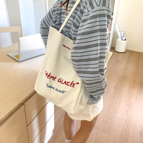 大容量帆布通勤包双面背条纹单肩