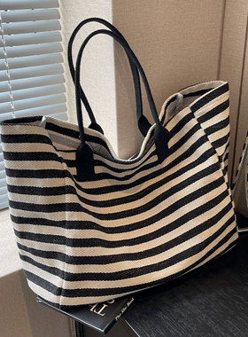 通勤包女大容量手提袋包包2025新款小众斑马纹帆布单肩妈咪托特包