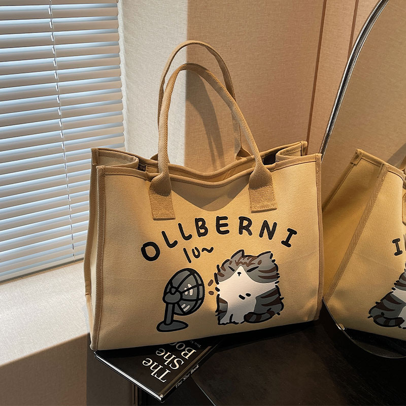 手提单肩通勤包百搭上课托特包