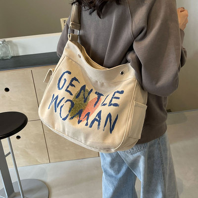 休闲帆布斜挎包女百搭通勤包