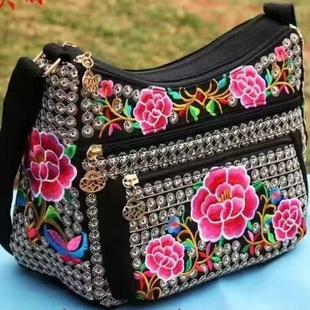 民族风中年斜挎包网红同款休闲刺绣帆布绣花单肩拉链翅膀手提包