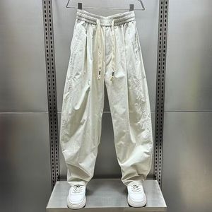 1506/QG2220/P42夏季薄款束脚运动裤男宽松九分休闲裤工装弯刀裤1图片