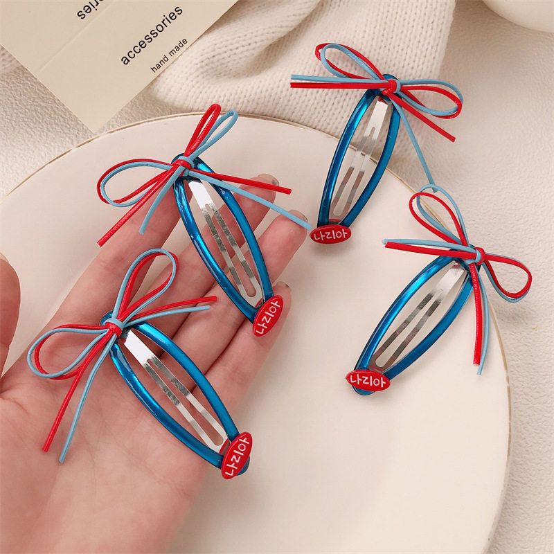 韩国撞色皮质蝴蝶结发夹女2025