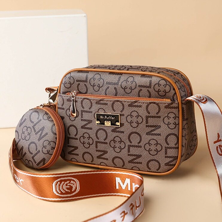 印花纹单肩包女小圆包妈妈斜挎包中老年买菜手机包软皮多层休闲潮