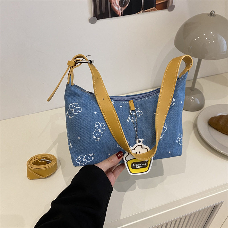 简约时髦休闲单肩腋下包包女潮2025夏季新款上班通勤牛仔布饺子包,箱包皮具/热销女包/男包,腋下包,淘宝优惠券,粉丝福利购,淘宝优惠卷