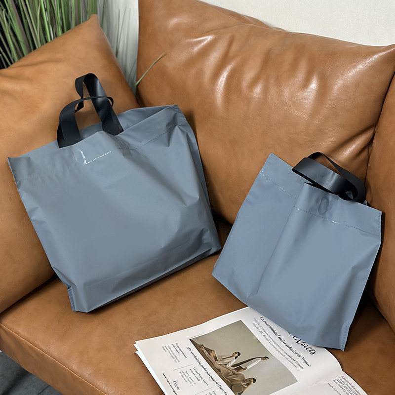 新款磨砂灰色服装店手提袋塑料礼品礼物袋子衣服购物袋定制LOGO