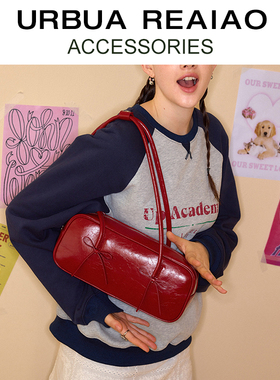 小众真皮腋下包女2025春季新款蝴蝶结红色法棍包手提单肩波士顿包