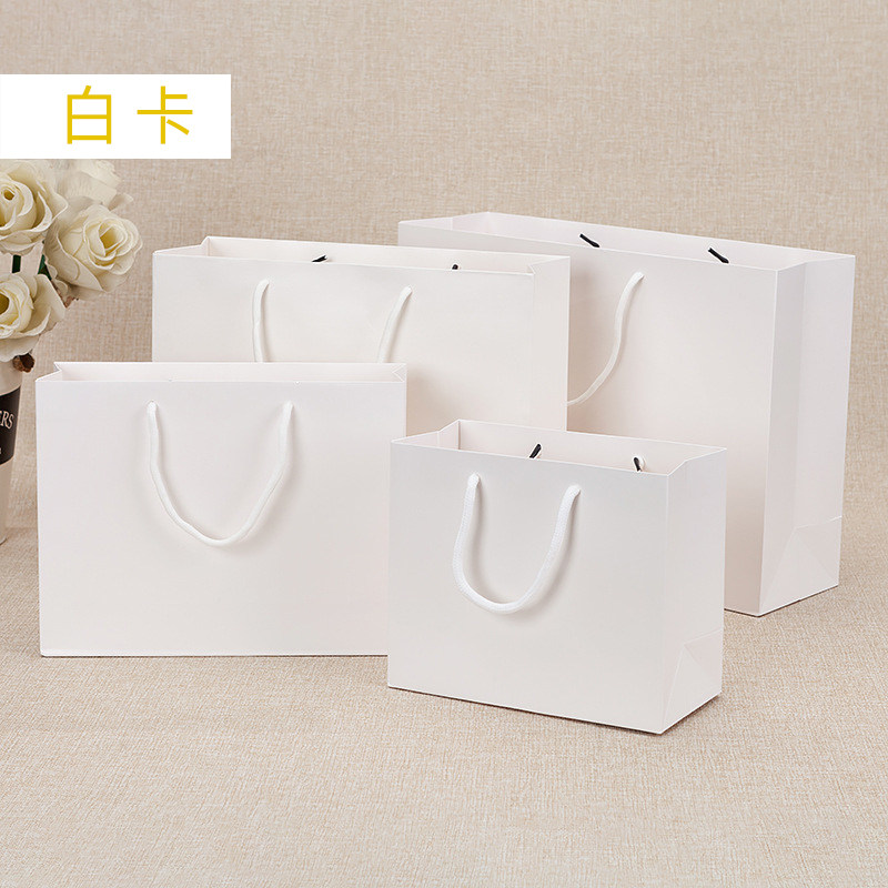 白卡纸袋手提袋礼品袋服装店时尚包装袋女款购物袋广告袋LOGO定制