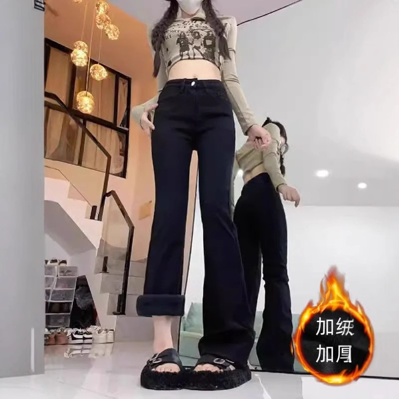复古港风2025冬新款加绒加厚黑色修身显瘦微喇牛仔裤女