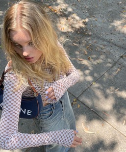 Source unknown elsa同款牛奶巧克力格子镂空斜扣不规则上衣