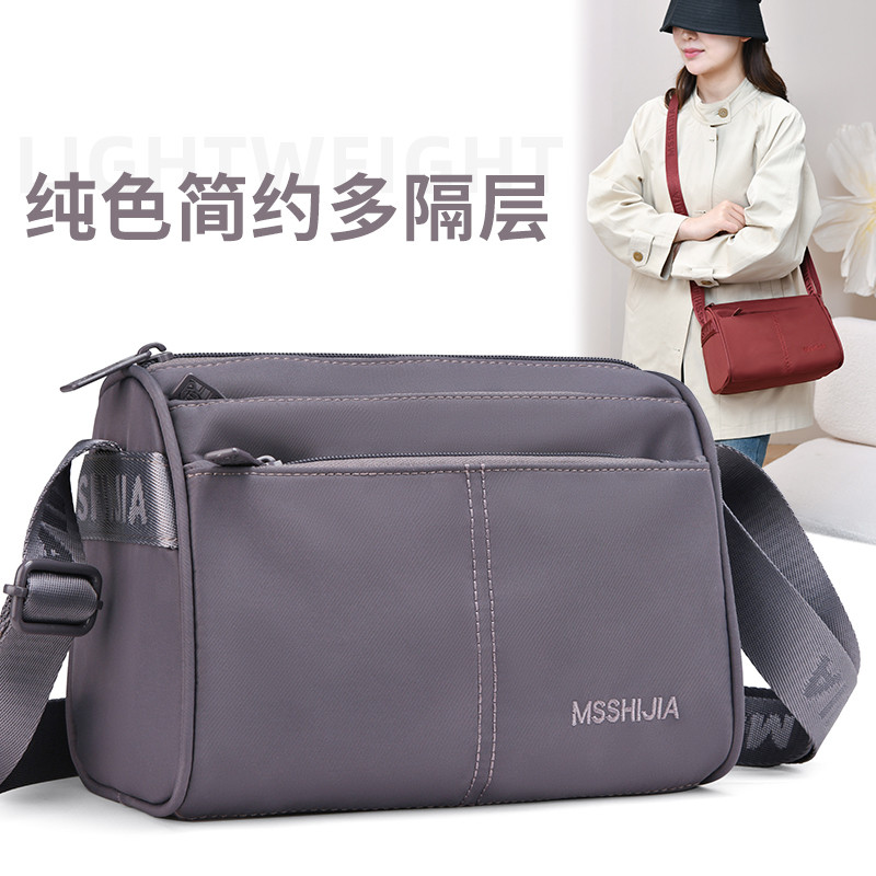 牛津布斜挎包小包包女2026新款多层简约轻便尼龙单肩包时尚妈咪包