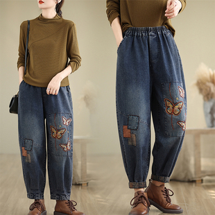 秋季新款松紧高腰蝴蝶刺绣牛仔哈伦裤女大码宽松显瘦休闲九分裤子