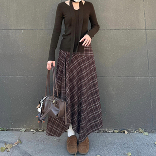 大码 美拉德咖色不规则下摆格子半身裙女秋季 胖mm梨形身材a字伞裙