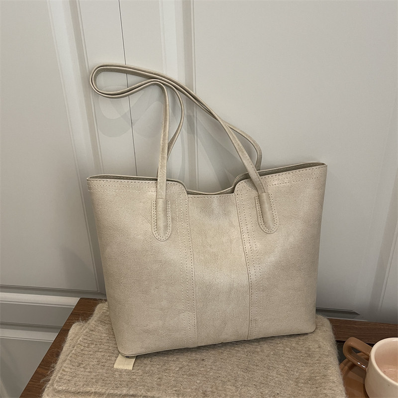 欧美潮大容量质感手抓纹通勤包女式2026春季潮休闲拼接单肩托特包