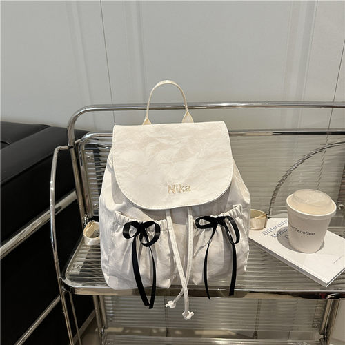 休闲帆布蝴蝶结双肩包女式包包