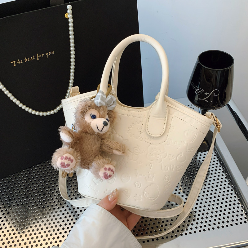 春夏新款高级可爱压花质感手提水桶包包潮流韩版百搭气质斜挎包女,箱包皮具/热销女包/男包,水桶包,淘宝优惠券,粉丝福利购,淘宝优惠卷