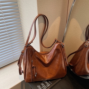 韩版复古大容量托特包2025新款PU软皮休闲单肩包多功能三用双肩包