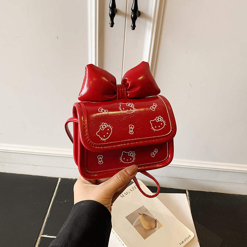 网红儿童包包2026新款可爱猫咪女童斜挎包洋气蝴蝶结小女孩零钱包