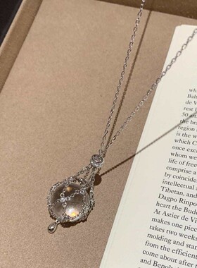 小红书爆款白水晶星芒网兜吊坠伸缩项链配饰小众设计高级感百搭女
