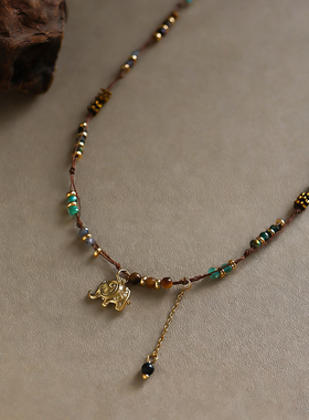 新款复古流苏虎眼石小象项链配饰女轻奢小众高级感编织串珠锁骨链