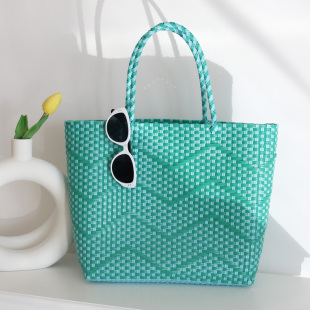 法式 海边度假沙滩单肩藤编文艺水桶包包 编织包草编包女夏2024新款