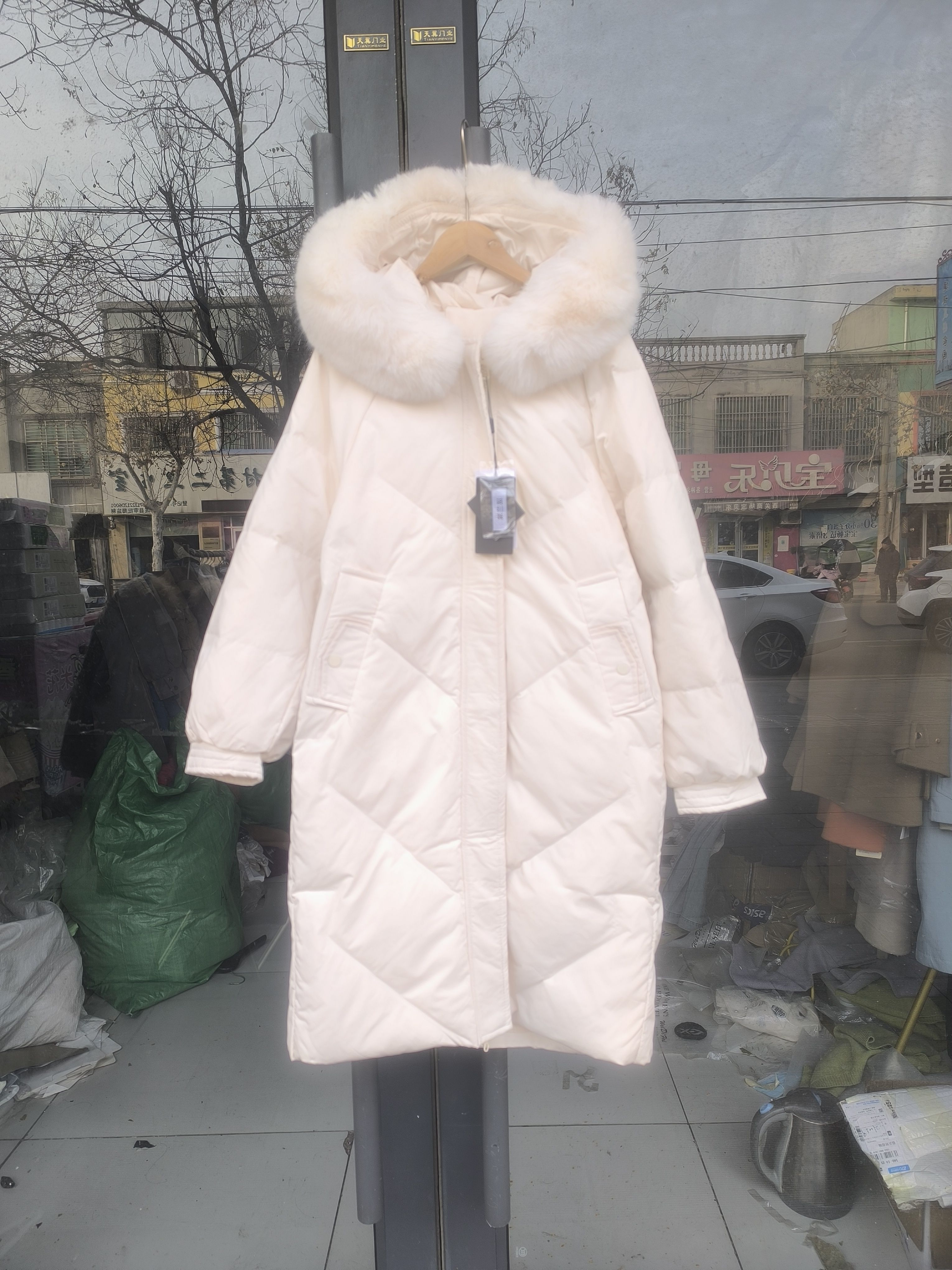 清仓新款仿毛领羽绒服女长款韩版宽松加厚白鸭绒外套女品牌尾货