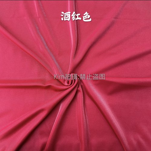 酒红色亮丝布少数民族服装面料
